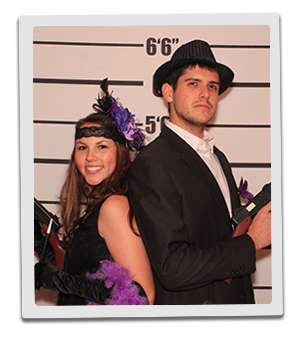 Orlando Murder Mystery party guests pose for mugshots