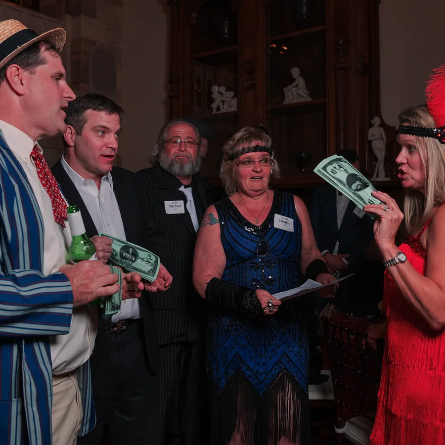 Guests at a Murder Mystery Company public dinner show in Orlando
