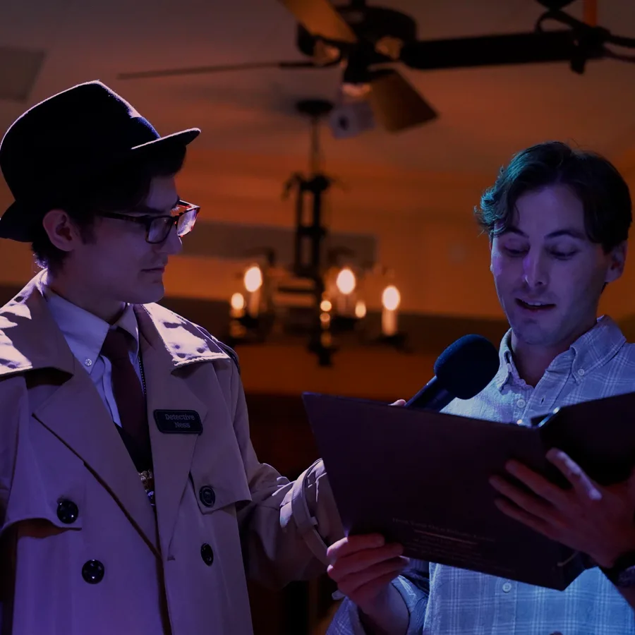 Professional actors performing at a Orlando murder mystery