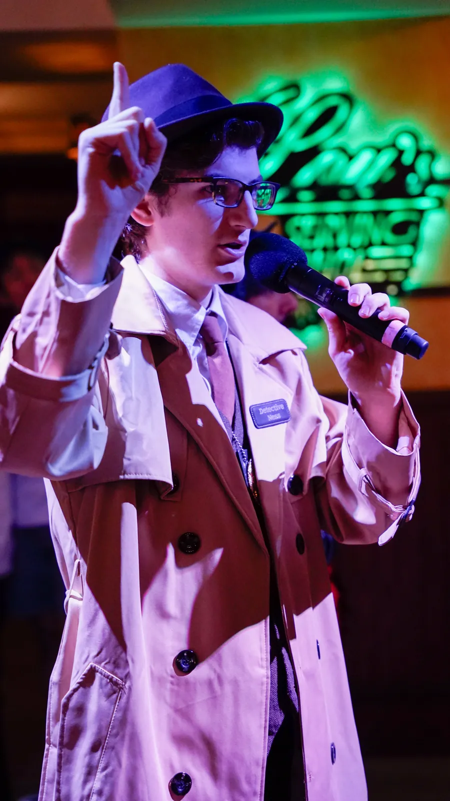 A Murder Mystery Company actor working the room at a Orlando show