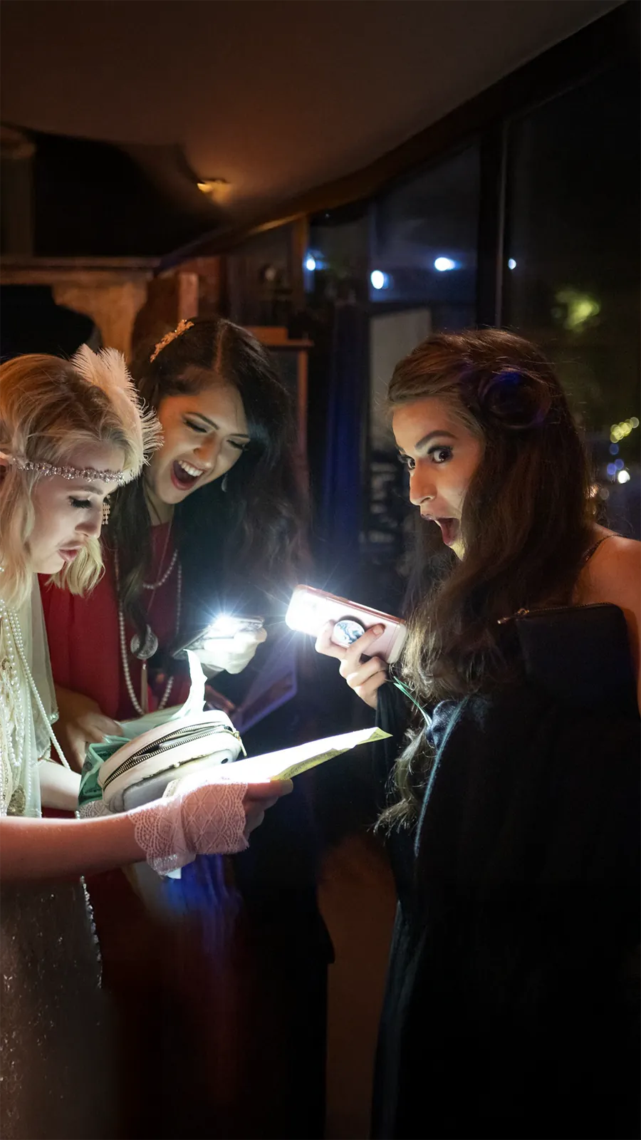 Guests at a Murder Mystery Company public dinner show in Orlando